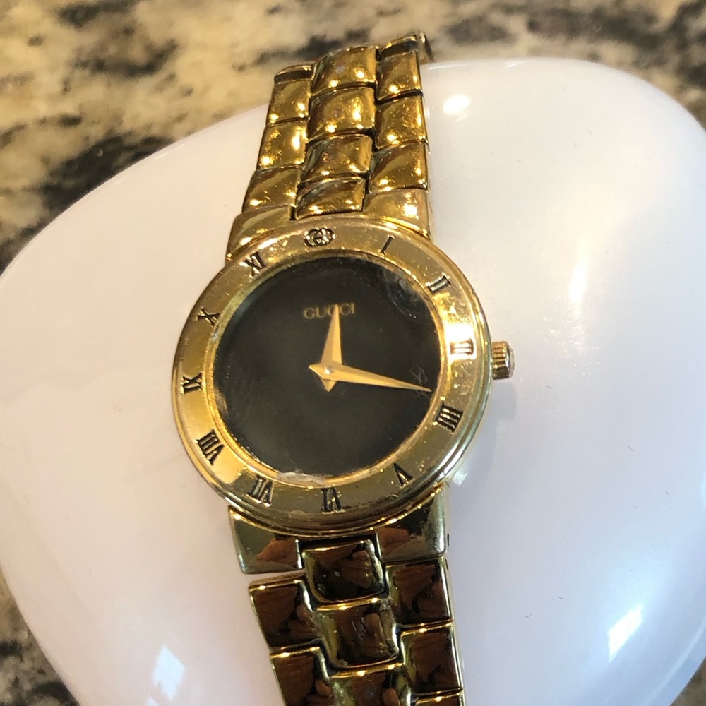 Ladies gold Gucci watch